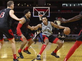 Raptors rookie Scottie Barnes controls the ball during a team scrimmage in London, Ont., on Saturday.