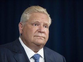 Ontario Premier Doug Ford attends a press briefing at Queen's Park in Toronto, on Friday October 15, 2021.