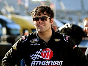 John Wes Townley, driver of the #05 Jive Communications/Zaxby's Chevrolet, looks on during qualifying for the NASCAR Camping World Truck Series Texas Roadhouse 200 presented by Alpha Energy Solutions at Martinsville Speedway on Oct. 29, 2016 in Martinsville, Va.