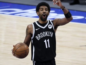 May 6, 2021; Dallas, Texas, USA; Brooklyn Nets guard Kyrie Irving (11) reacts during the third quarter against the Dallas Mavericks at American Airlines Center. Mandatory Credit: Kevin Jairaj-USA TODAY Sports ORG XMIT: IMAGN-449250