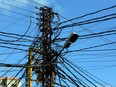 Electricity cables are seen in Tyre, Lebanon July 18, 2020.