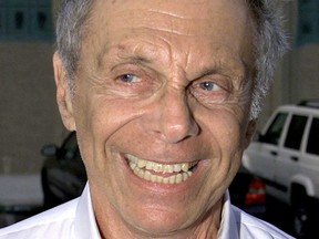Satirist Mort Sahl arrives as a guest for Woody Allen's performance with Eddy Davis and His New Orleans Jazz Band Aug. 8, 2001 in Los Angeles.