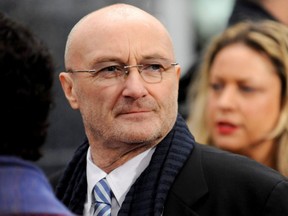 British rocker Phil Collins arrives at the Hollywood world premiere of "Mirror Mirror" in Los Angeles, March 17, 2012.