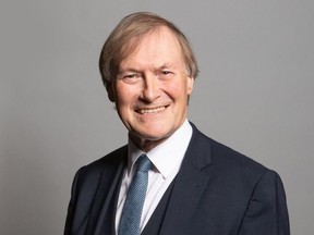 An undated handout photograph released by the UK Parliament shows Conservative MP for Southend West, David Amess, posing for an official portrait photograph at the Houses of Parliament in London.
