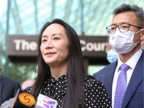 Huawei Technologies Chief Financial Officer Meng Wanzhou speaks to media outside the B.C. Supreme Court following a hearing about her release in Vancouver, Sept. 24, 2021.