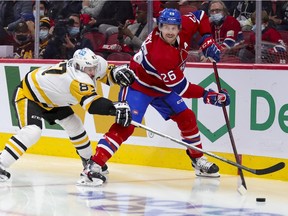 Montreal Canadiens defenceman Jeff Petry is pressured by Pittsburgh Penguins centre Sidney Crosby during second period in Montreal on Nov. 18, 2021.
