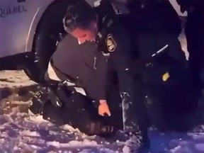 In footage posted to social media, a Quebec City police officer is seen shoving snow in the face of a Black youth while they are pinned on the ground.