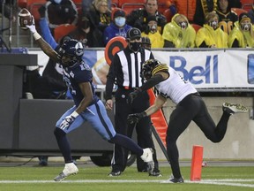 Kurleigh Gittens Jr. of the Toronto Argonauts scores a touchdown against the Hamilton Tiger-Cats during a Canadian Football League game in Toronto on Nov. 12, 2021.