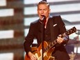 Singer Bryan Adams performs during the closing ceremony for the Invictus Games in Toronto, Sept. 30, 2017.