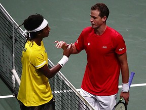 Sweden's Mikael Ymer celebrates after winning his match against Canada's Vasek Pospisil during the Davis Cup Finals at Madrid Arena in Spain.