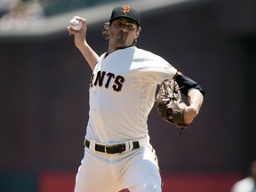 Starting pitcher Kevin Gausman delivers a pitch during a game against the Arizona Diamondbacks last season while a member of the San Francisco Giants. Gausman is joining the Blue Jays.