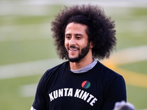 Colin Kaepernick looks on during his NFL workout held at Charles R Drew high school on November 16, 2019 in Riverdale, Georgia.