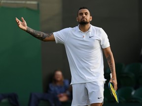 Nick Kyrgios of Australia celebrates match point during his men's singles second round match against Gianluca Mager of Italy during Day Four of The Championships - Wimbledon 2021 at All England Lawn Tennis and Croquet Club on July 01, 2021 in London, England.
