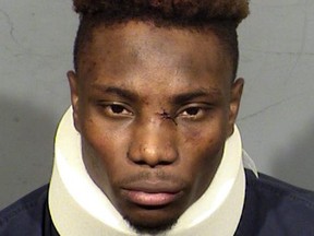 In this handout photo provided by the Las Vegas Metropolitan Police Department on Nov. 2, 2021, former Las Vegas Raiders wide receiver Henry Ruggs III is seen in a police booking photo after his arrest fon felony charges of driving under the influence of alcohol resulting in death and reckless driving in Las Vegas, Nevada.