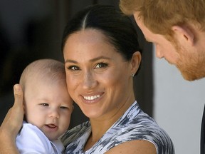 Britain's Prince Harry and his wife Meghan, Duchess of Sussex holding their son Archie, meet Archbishop Desmond Tutu (not pictured) at the Desmond & Leah Tutu Legacy Foundation in Cape Town, South Africa, September 25, 2019. REUTERS/Toby Melville