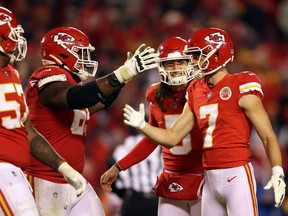 Chiefs' Harrison Butker, right, is congratulated by teammates after kicking the game-winning field goal during the second half against the Giants at Arrowhead Stadium in Kansas City, Mo., Monday, Nov. 1, 2021.