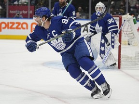 Toronto Maple Leafs forward John Tavares (91) heads up ice against the San Jose Sharks during the first period at Scotiabank Arena.