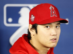 Shohei Ohtani of the Los Angeles Angels looks on before the game against the Seattle Mariners at T-Mobile Park on Oct. 3, 2021 in Seattle, Washington.