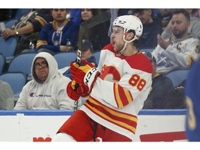 The Calgary Flames’ Andrew Mangiapane (88) celebrates after a goal against the Buffalo Sabres at Keybank Center in Buffalo, N.Y., on Thursday, Nov. 18, 2021.
