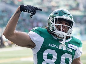 Saskatchewan Roughriders receiver Kian Schaffer-Baker (89) celebrates his first-quarter touchdown reception.