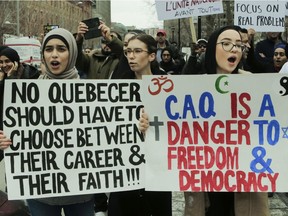 Controversy has swirled over a law introduced by Premier François Legault's Coalition Avenir Québec government in 2019 that bars some public employees, including teachers, from wearing religious symbols such as the Muslim hijab.