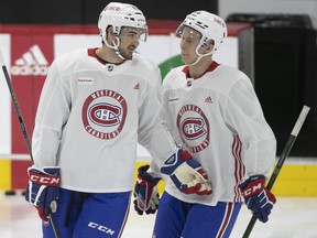 Montreal Canadiens Brandon Baddock, left, Jesse Ylonen during training camp in Brossard in September 2021.