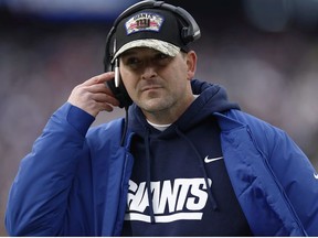 Head coach Joe Judge of the New York Giants looks on during the second quarter against the Dallas Cowboys at MetLife Stadium on December 19, 2021 in East Rutherford, New Jersey.