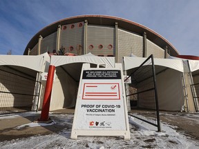 The Scotiabank Saddledome, home of the Calgary Flames, was photographed on Monday, December 13, 2021. The NHL is postponing games after nine players and one staff member received positive COVID-19 tests.