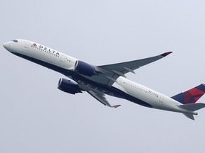 A Delta Air Lines Airbus A350-900 takes off from Sydney Airport in Sydney, Australia, October 28, 2020.
