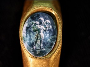 A centuries-old ring engraved with an Early Christian image of Jesus as the "Good Shepherd" that was recovered from shipwrecks off Caesarea, a major Holy Land port in ancient times, according to the Israel Antiquities Authority, is displayed in Jerusalem Dec. 22, 2021.