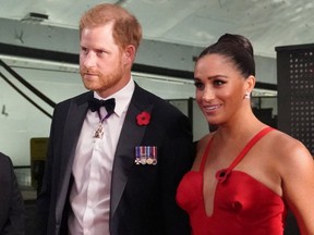 Britain's Prince Harry, Duke of Sussex and Meghan, Duchess of Sussex, arrive to the Intrepid, Sea Air & Space Museum's inaugural Intrepid Valor Awards on November 10, 2021 in New York.