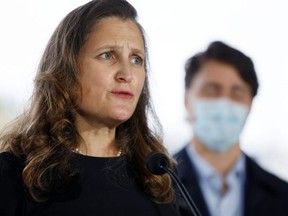 Deputy Prime Minister and Minister of Finance Chrystia Freeland and Prime Minister Justin Trudeau take part in a news conference outside the Children's Hospital of Eastern Ontario in Ottawa, Oct. 21, 2021.