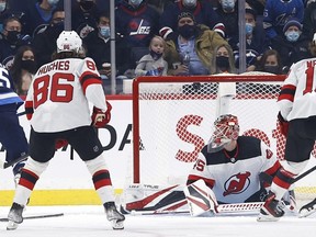 Winnipeg Jets centre Mark Scheifele scores on New Jersey Devils goaltender Jonathan Bernier at Canada Life Centre Friday night. USA TODAY Sports