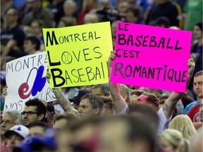 Montreal baseball fans fill the stands during a preseason Major League Baseball between the Toronto Blue Jays and the New York Mets at Olympic Stadium, March 28, 2014.