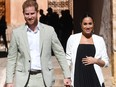 Prince Harry, Duke of Sussex, and Meghan, Duchess of Sussex, walk through the walled public Andalusian Gardens which has exotic plants, flowers and fruit trees during a visit on Feb. 25, 2019 in Rabat, Morocco.