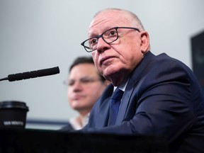 New Vancouver Canucks President of Hockey Operations and Interim General Manager Jim Rutherford arrives for his first news conference since being hired by the NHL hockey team, in Vancouver, on Monday, December 13, 2021.