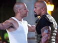 Vin Diesel and Dwayne Johnson in a scene from 2011's Fast Five.