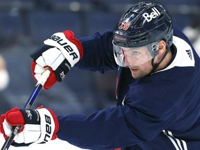 David Gustafsson shoots during Winnipeg Jets practice on Thursday.