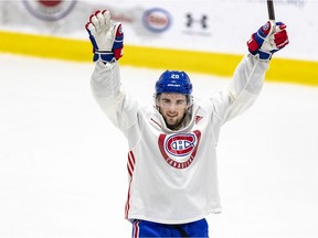 Montreal Canadiens defenceman Chris Wideman celebrates a victory by the white team during a competition at practice at the Bell Sports Complex in Brossard on Jan. 10, 2022.