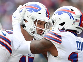 Josh Allen (left) and Stefon Diggs of the Buffalo Bills celebrate touchdown.