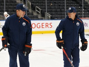 Associate Coaches Jim Playfair (left) and Glen Gulutzan speak during Edmonton Oilers Training Camp at Rogers Place in Edmonton, on Wednesday, Sept. 18, 2019.