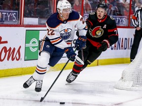 File photo/ Ottawa Senators left wing Brady Tkachuk pursues Edmonton Oilers defenceman Tyson Barrie during third period NHL action at the Canadian Tire Centre.