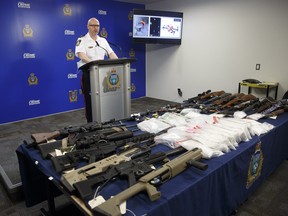 Winnipeg Police Inspector Elton Hall of the Organized Crime Unit speaks about Operation Phoenix during a press conference at Winnipeg Police Headquarters Thursday morning. MIKE DEAL/POOL