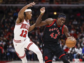 Raptors forward Pascal Siakam (43) is defended by Chicago Bulls guard Ayo Dosunmu on Wednesday night.