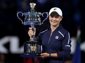 Australia's Ashleigh Barty poses with the Daphne Akhurst Memorial Cup after winning the womens singles final match against Danielle Collins of the U.S. on day thirteen of the Australian Open tennis tournament in Melbourne on Jan. 29, 2022.