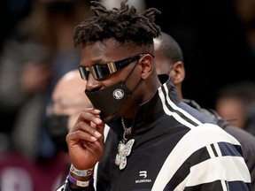 Former Buccaneers receiver Antonio Brown attends an NBA game between the Nets and Grizzlies at the Barclays Center in the Brooklyn borough of New York City, Jan. 3, 2022.