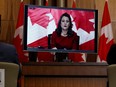 Deputy Prime Minister and Minister of Finance Chrystia Freeland virtually takes part in a news conference before tabling the government's economic and fiscal update in Ottawa, Tuesday, Dec. 14, 2021.