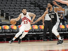 Raptors' Fred VanVleet drives to the net against San Antonio Spurs' Keita Bates-Diop during the second half at Scotiabank Arena on Tuesday, Jan. 4, 2021. Mandatory Credit: