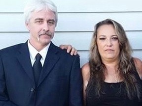 Jonathon Grunewald, 52, (L) and Malinda Phillips, 47 are shown in an undated supplied image. Calgary police have charged the parents in relation to their 27-year-old son's neglect after he was discovered on Oct. 24, 2020 unresponsive in the home in the northeast Calgary community of Falconridge.