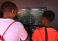 Gamers play a new version of the 'EA SPORTS Madden NFL' video game at the EA PLAY event in Hollywood, California on June 8, 2019. (Photo by Mark RALSTON / AFP) (Photo credit should read MARK RALSTON/AFP via Getty Images)